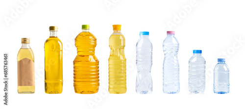 Vegetable oil with olive oil and water in different bottle for cooking isolated on white background with clipping path.
