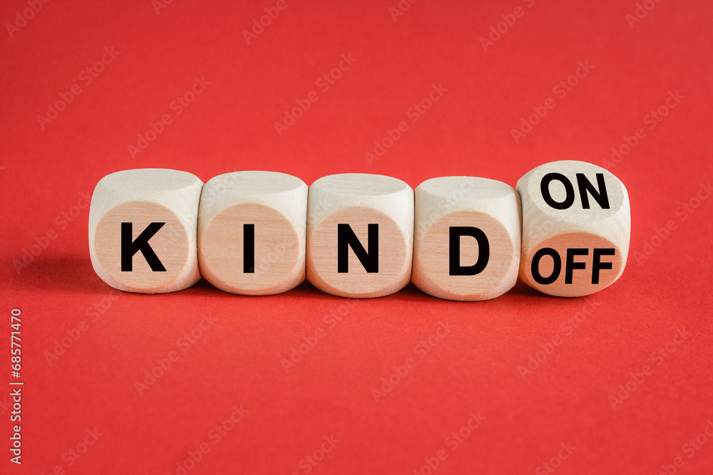 Kind on or off symbol. Turned wooden cubes and changes word Kind off to Kind on. Beautiful light red background. Business and kind on or off concept. Copy space. Kind on or off symbol. Turned wooden cubes and changes word Kind off to Kind on. Beautiful light red background. Business and kind on or off concept. Copy space.