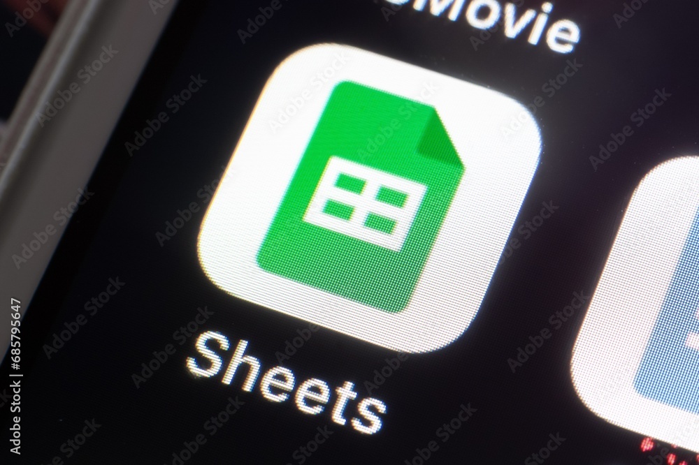 Icon of Google Sheets mobile app on iOS smartphone Stock Photo Adobe