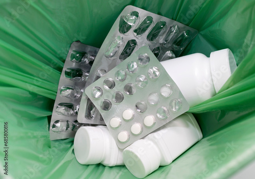 Closeup Garbage Can, Trash Bin Full Of Medication. Pills, Tablet Bottles, Empty Capsule Pastilles. Medical Waste, Supplement Over Consumption Concept. Pharmacy. Horizontal Plane Selective Focus