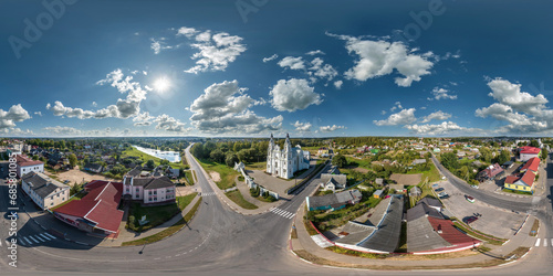 aerial full hdri 360 panorama  view on white baroque catholic church in countryside or village in equirectangular projection with zenith and nadir. VR  AR content photo