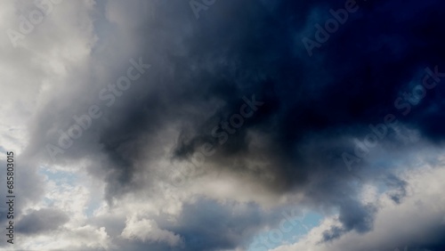 Light in the Dark and Dramatic Storm Clouds background © kinomaster