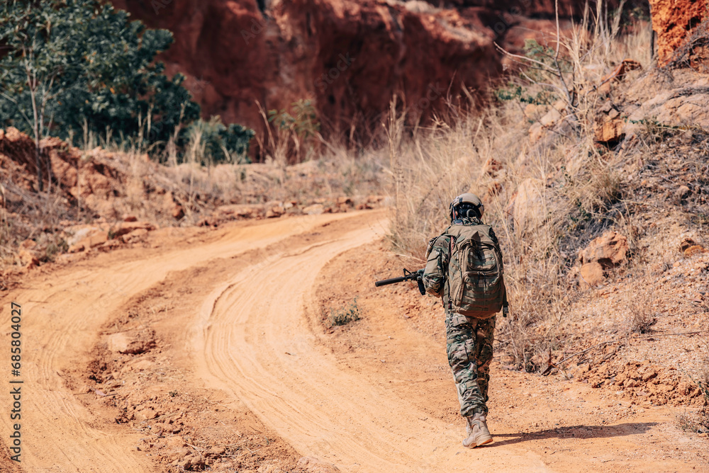 Soldiers of special forces on wars at the desert,Thailand people,Army soldier Walking patrol. Soldiers of special forces on wars at the desert,Thailand people,Army soldier Walking patrol.