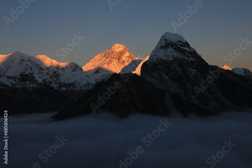 Sunset view from the Gokyo Valley  Mount Everest and sea of fog.