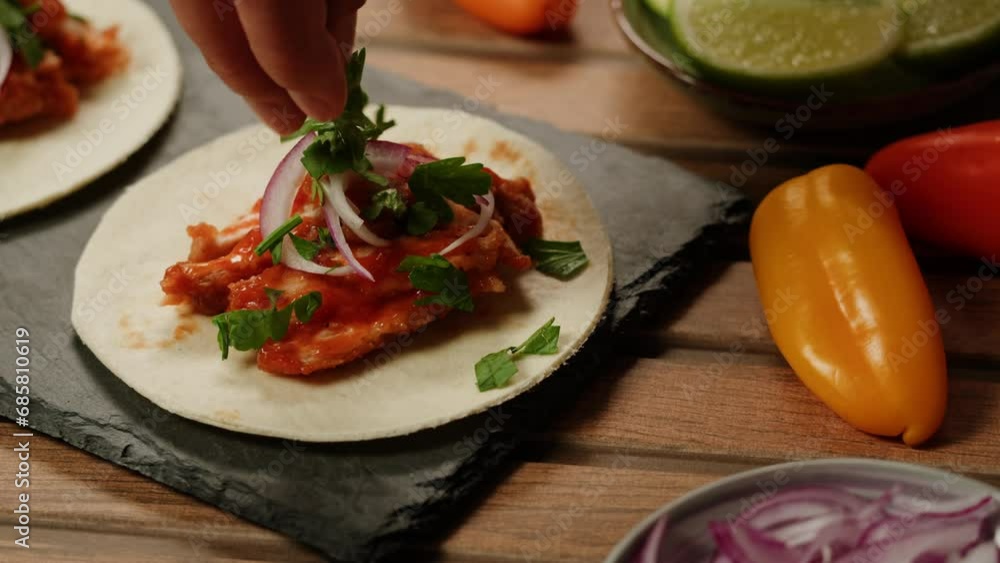 Traditional mexican food tacos with onion on the top close-up. Homemade tacos with meat and vegetables Traditional mexican food tacos with onion on the top close-up. Homemade tacos with meat and vegetables