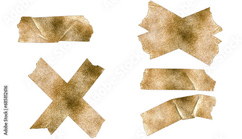 Fotografie Set of 4 pieces of metallic gold-plated brown tape with different states of adhe