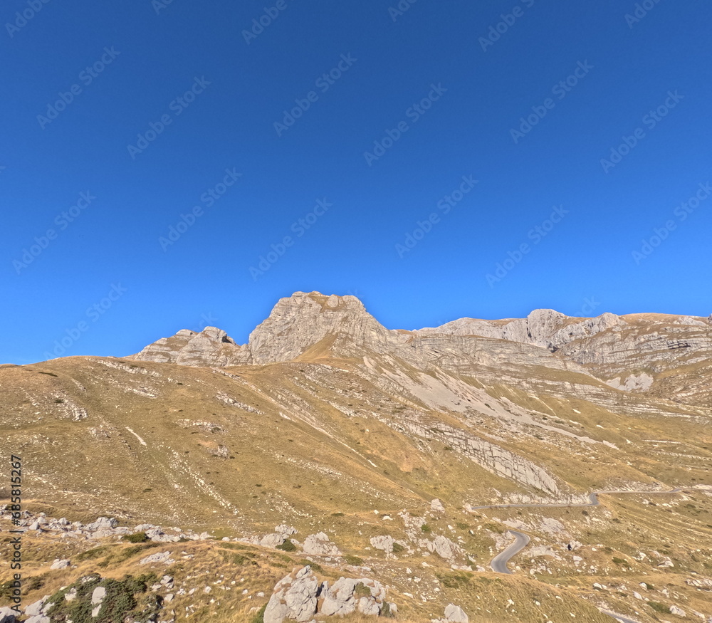 Mountain landscape on Durmitor mountain in Montenegro beautiful Durmitor National park with scenic mountains view,aerial panorama Balkan,Balcan countries,followcam of van passing through mountain road