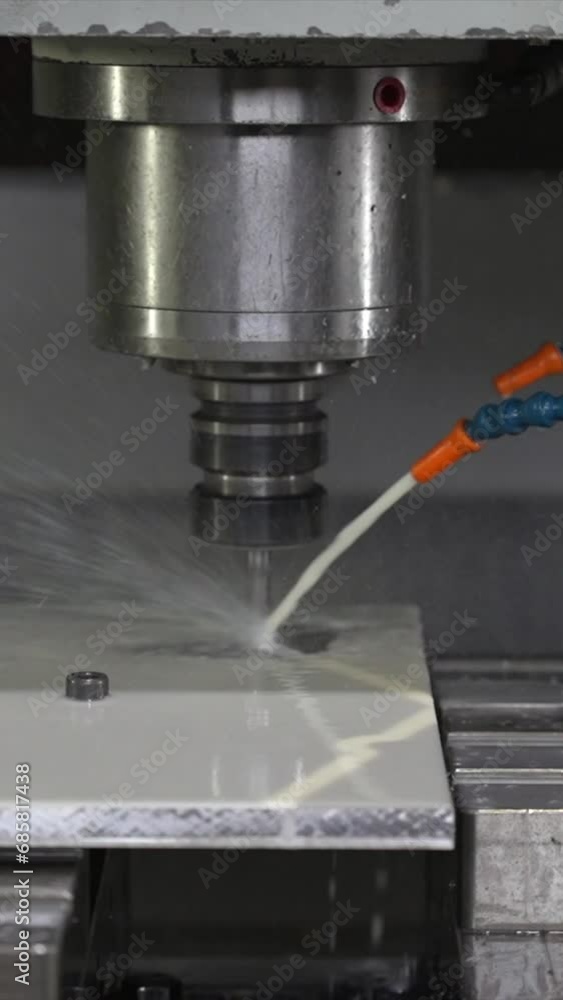 Cnc modern milling machine cutting a mould Cnc modern milling machine cutting a mould
