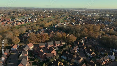 Aerial view of Repton Park (Ashford, Kent) small British city with woodlands and countryside view. 