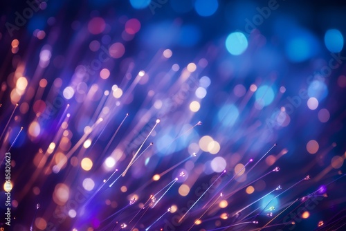 Defocused image of fiber optics blue and purple lights abstract background