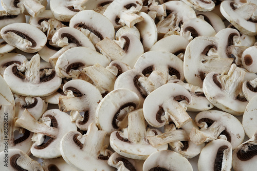 champignon cut into slices background, close-up, without people, top view