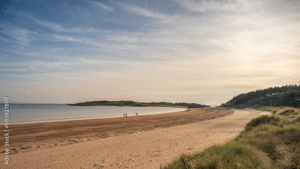 A bright day on the coast at Ynys Llanddwyn, Angelsey, North Wales. Also known as Newborough Beach A bright day on the coast at Ynys Llanddwyn, Angelsey, North Wales. Also known as Newborough Beach