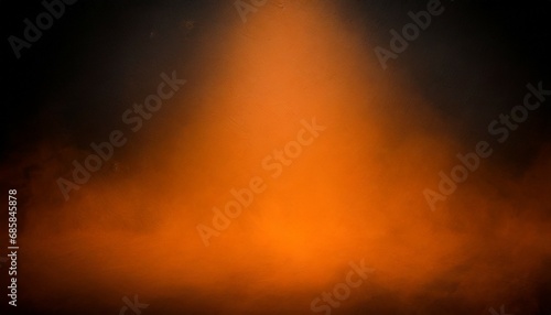 orange and black background in halloween and autumn colors bright orange spotlight and black border shadow design