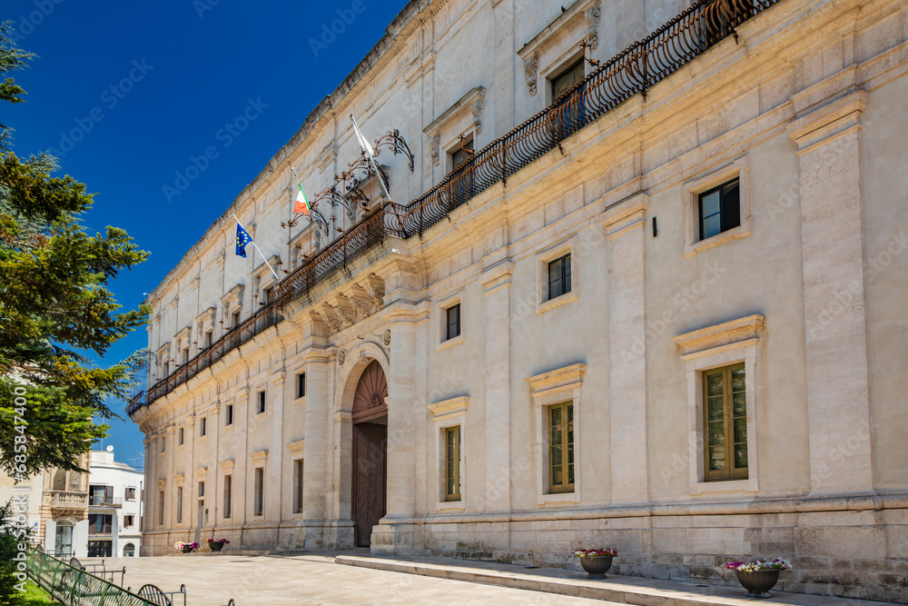 Martina Franca, Taranto, Puglia, Italy. Village with baroque architecture. The Ducal Palace, now the town hall, in Piazza Roma. Sunny day in summer.
