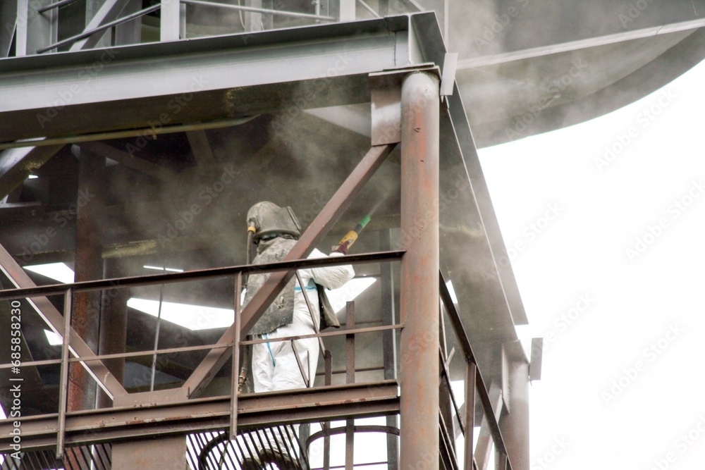 Φωτογραφία Sand blasting process