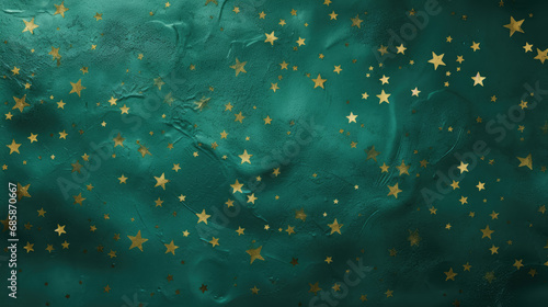Paper painted with emerald paint with golden small stars