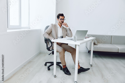 Businessman attractive smart paper caucasian company document suit office happy laptop holding planning © SHOTPRIME STUDIO