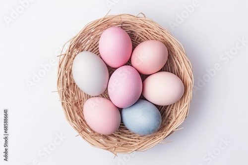 Wallpaper Mural Pastel pink and blue Easter eggs in a nest on the white background. Top view spring backdrop. Torontodigital.ca