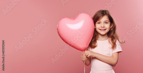 Cute Little Girl Holding a ...