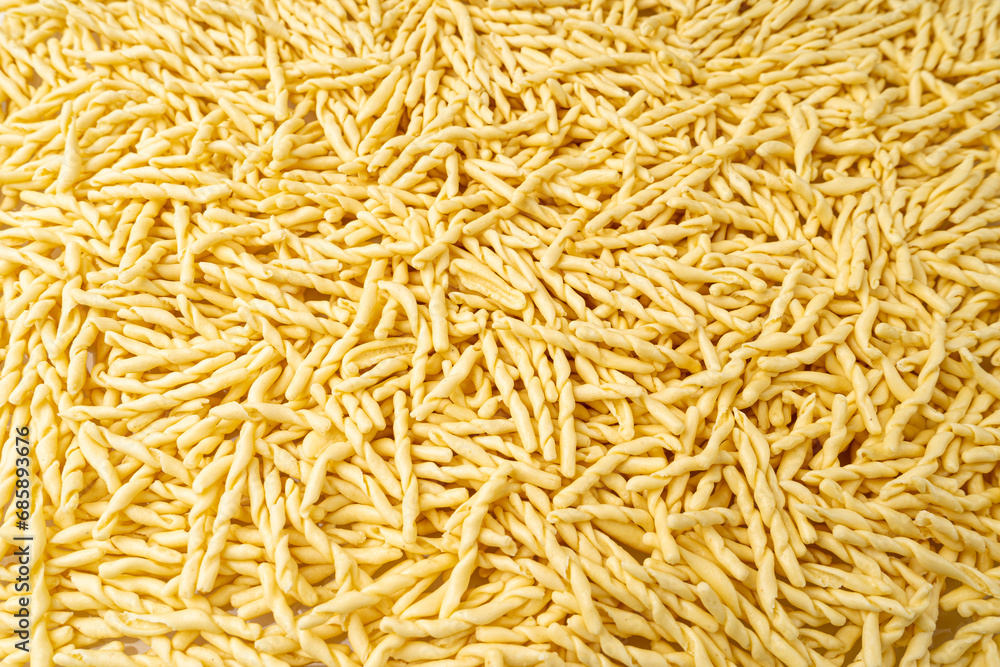 Raw Trofie Pasta, Dry Italian Macaroni, Traditional Genoa Food, Raw Noodle, Modern Ligurian Cuisine Raw Trofie Pasta, Dry Italian Macaroni, Traditional Genoa Food, Raw Noodle, Modern Ligurian Cuisine