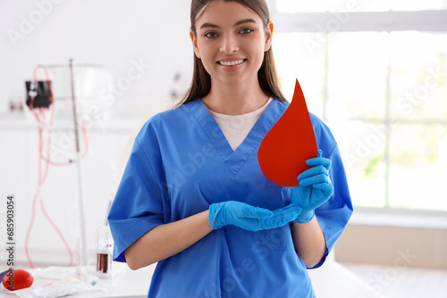 Female nurse with paper blo...