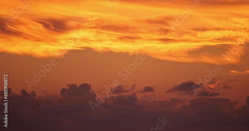 4K sunrise dawn morning timelapse golden sky. Vibrant clouds and soft pastel hues creating a tranquil and inspiring start to the day