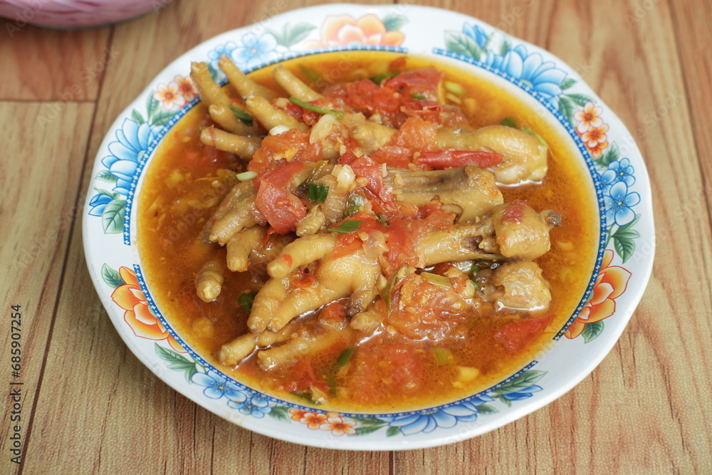 Chicken feet seasoned with vegetables. Chicken feet seasoned with vegetables.