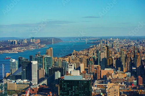 Uptown NYC skyline along the Hudson River on a sunny day