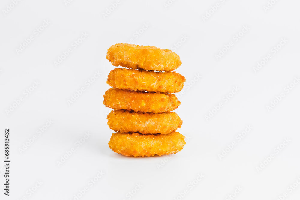 Chicken Breaded Fillet.Fast food. Breaded Chicken Inner Fillet on a White Background,Chicken Breaded Raw Meat. Fast cooking. Breaded chicken nuggets. Homemade food at home. Chicken Breaded Fillet.Fast food. Breaded Chicken Inner Fillet on a White Background,Chicken Breaded Raw Meat. Fast cooking. Breaded chicken nuggets. Homemade food at home.