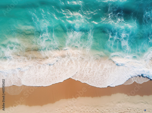 Aerial view of an empty beach with turquoise waters 
