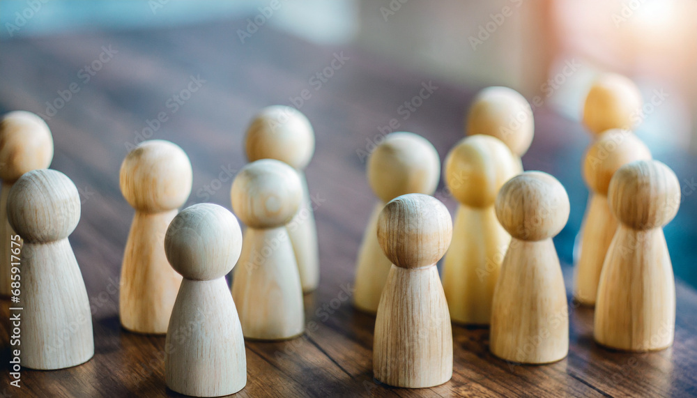 Group of diverse wooden figurines in a line, symbolizing unity, teamwork, and community in social gatherings, isolated on a wooden table background with Christmas decorations Group of diverse wooden figurines in a line, symbolizing unity, teamwork, and community in social gatherings, isolated on a wooden table background with Christmas decorations