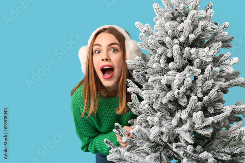 Surprised young woman with ...