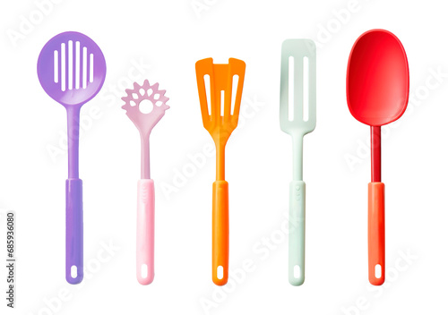 Colorful plastic kitchen utensils over isolated transparent background