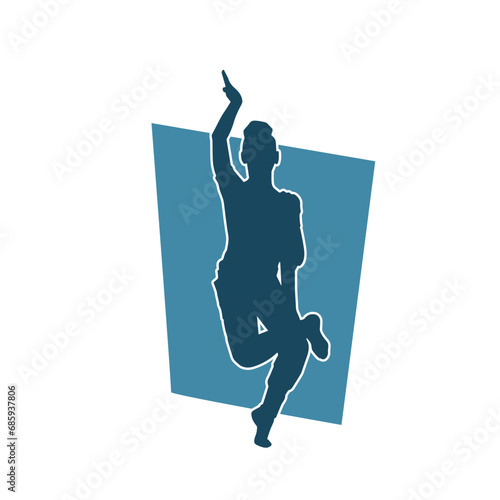 Silhouette of a female dancer in action pose. Silhouette of a woman dancing happily.