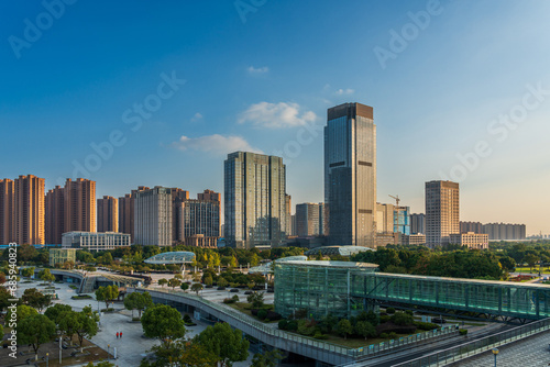 Nice modern city square and buildings in the distance © evening_tao