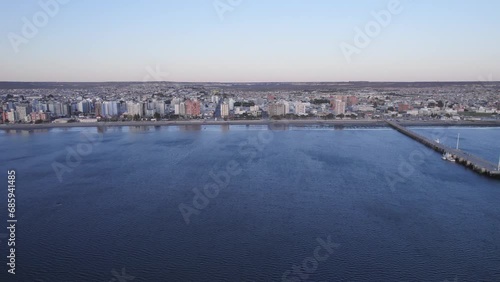 Wallpaper Mural Cinematic Drone view from Sea of the City of  Puerto Madryn in Argentina , tourist destination Torontodigital.ca