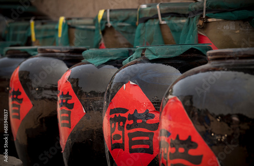 Chinese big traditional containers with Chinese character Cu which mean vinegar. Pingyao, China
