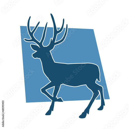 Silhouette of a wild deer forest animal with beautiful antlers.  photo