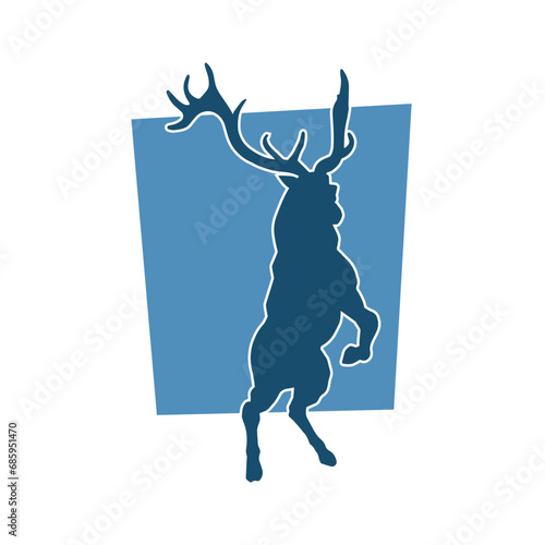 Silhouette of a wild deer forest animal with beautiful antlers. 