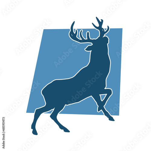 Silhouette of a wild deer forest animal with beautiful antlers. 