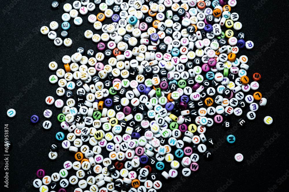 background of a collection of letters on a black background background of a collection of letters on a black background