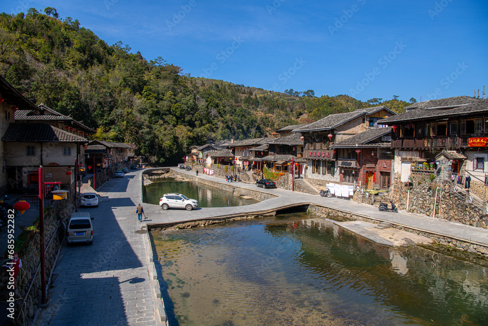 The small houses in the Tuxi village around Tulou clusters and the river