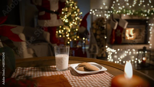 Wallpaper Mural Santa Claus bringing gifts, eating ginger cookies and drinking milk on Christmas night in the decorated living room with fireplace and Christmas tree Torontodigital.ca