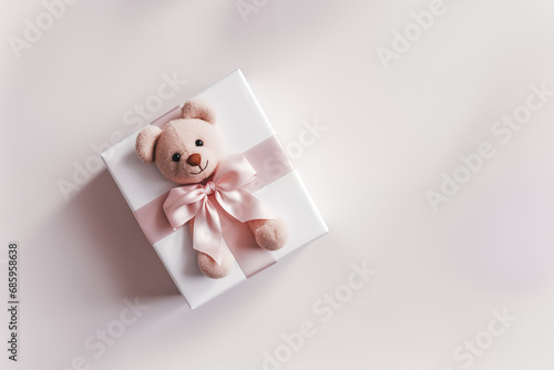 white gift box with teddy bear 