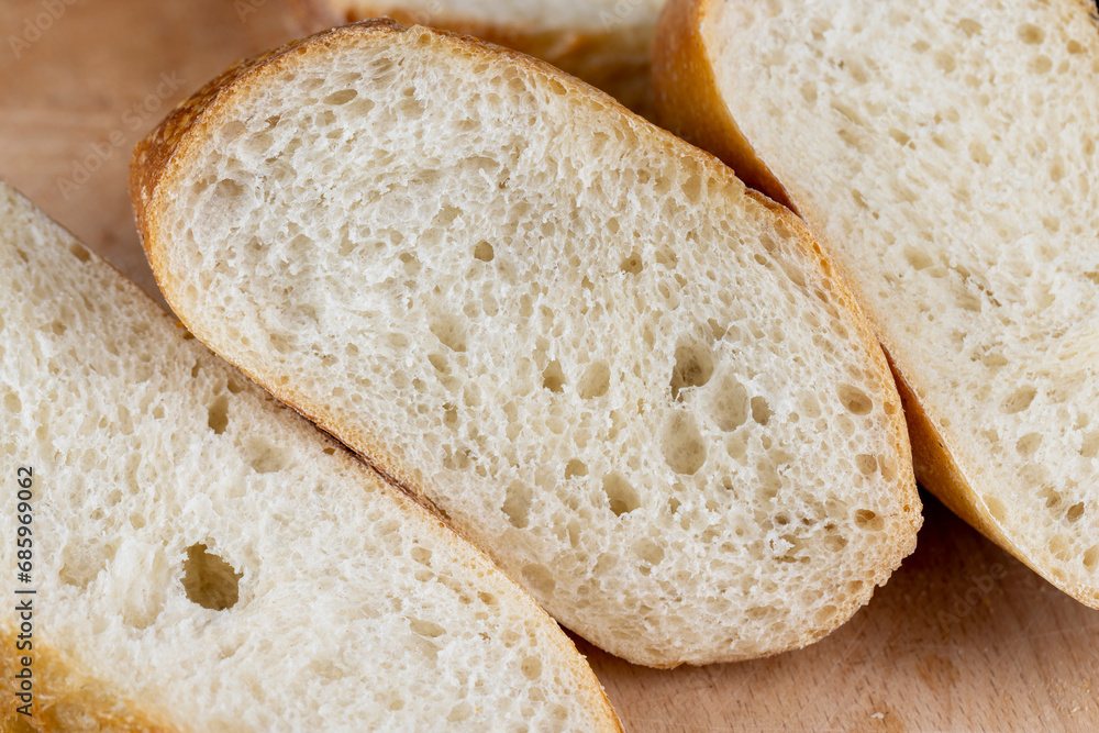 wheat loaf of bread close-up on the table wheat loaf of bread close-up on the table
