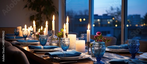 Hanukkah table set in living room, close-up. photo