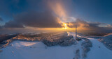 Aerial photo of winter landscape in the White Carpathians. Velka Javořina transmitter. Snowy winter landscape at sunset.