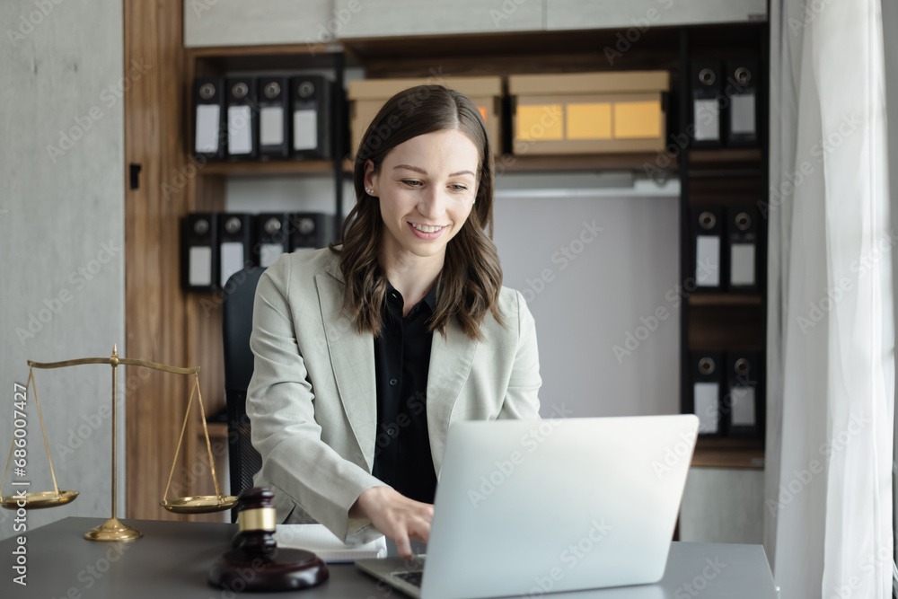 lawyer woman working and judge in a courtroom the gavel, justice and law concept. lawyer woman working and judge in a courtroom the gavel, justice and law concept.