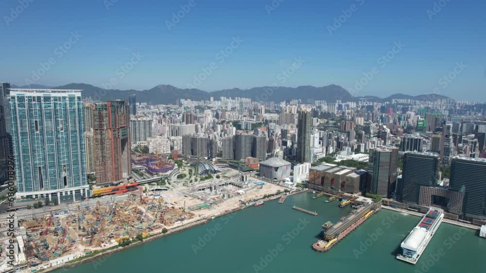 West Kowloon Cultural Area, A Waterfront Leisure Promenade Palace Museum Freespace near Tsim Sha Tsui, Central, Victoria Harbour, Hong Kong in the background, Aerial drone skyview West Kowloon Cultural Area, A Waterfront Leisure Promenade Palace Museum Freespace near Tsim Sha Tsui, Central, Victoria Harbour, Hong Kong in the background, Aerial drone skyview
