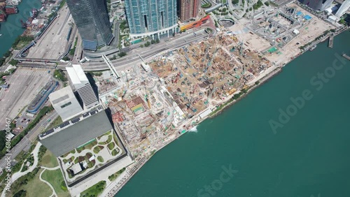 West Kowloon Cultural Area, A Waterfront Leisure Promenade Palace Museum Freespace near Tsim Sha Tsui, Central, Victoria Harbour, Hong Kong in the background, Aerial drone skyview photo